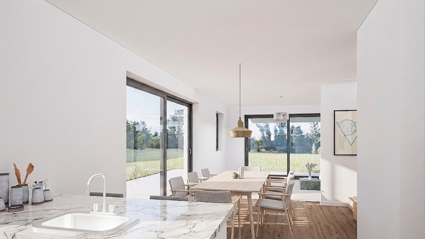 Cuisine ouverte et salle à manger donnant sur le jardin